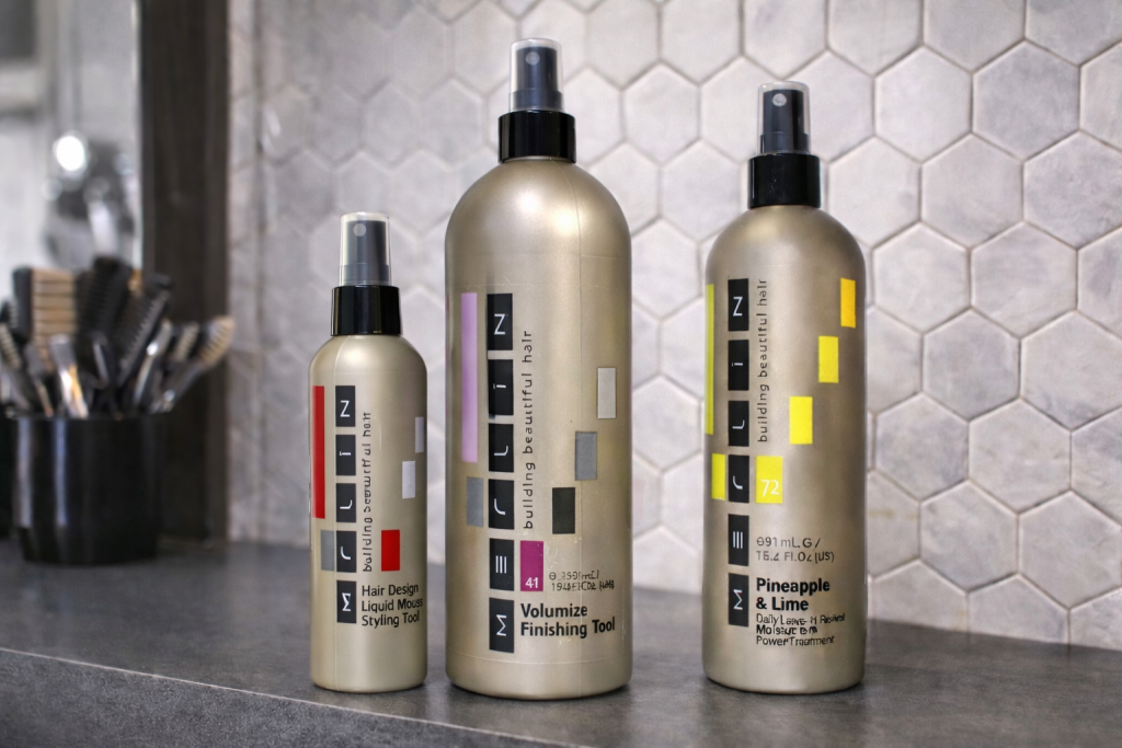 Professional hair products for a long-lasting blowout — mousse, styling spritz and finishing cream